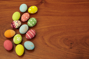 happy easter eggs on wooden