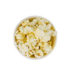 Popcorn in multi-colored festive glass isolated on a white background. The view from the top.