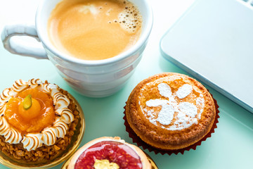 Handcrafted gourmet fruit tarts and pastries with coffee