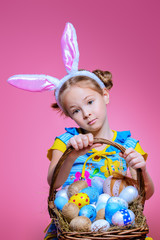 daughter with painted eggs