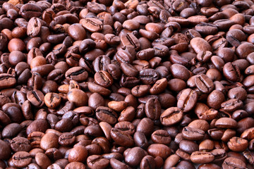 Coffee background, Coffee beans texture, Brown coffee caffeine beans background, texture, close-up
