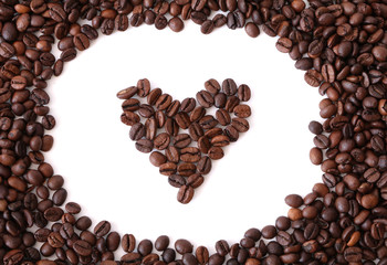 Coffee beans in shape of heart, heart from coffee beans isolated on a white background, with coffee beans around the edges