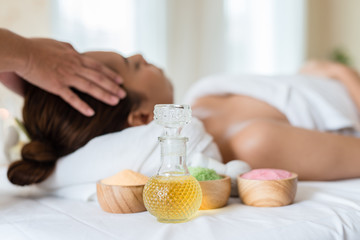 Obraz na płótnie Canvas Oils and salts used in a spa massage