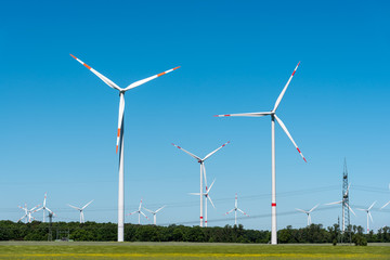 Fototapeta premium Wind generation plants seen in rural Germany