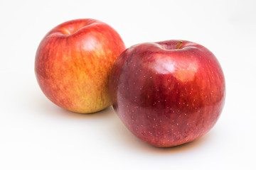 Fototapeta na wymiar Two apples isolated on white