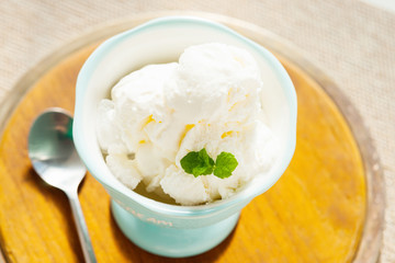 Ice cream in bowl and spoon 