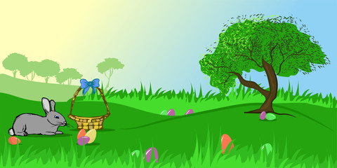 Obraz na płótnie Canvas Easter bunny on a meadow. Easter eggs. Landscape