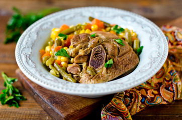 Thigh of turkey stew with vegetables: corn, green beans, carrots and bell pepper