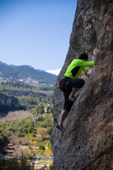 the climber on a route climbs in top
