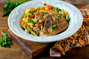 Thigh of turkey stew with vegetables: corn, green beans, carrots and bell pepper