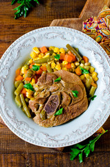 Thigh of turkey stew with vegetables: corn, green beans, carrots and bell pepper