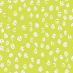 Seamless Easter pattern with eggs on green background. Vector.
