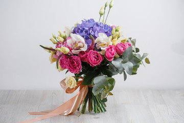 beautiful bouquet of different flowers. colorful color mix flower on a table