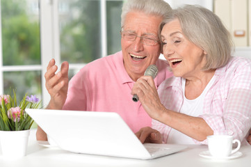 couple husband and wife singing songs