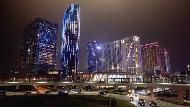 Colorful night view of Macau. Roundabout traffic at night