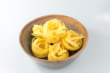 Noodle Nests in a Clay Bowl