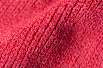 Texture of knitted red sweater