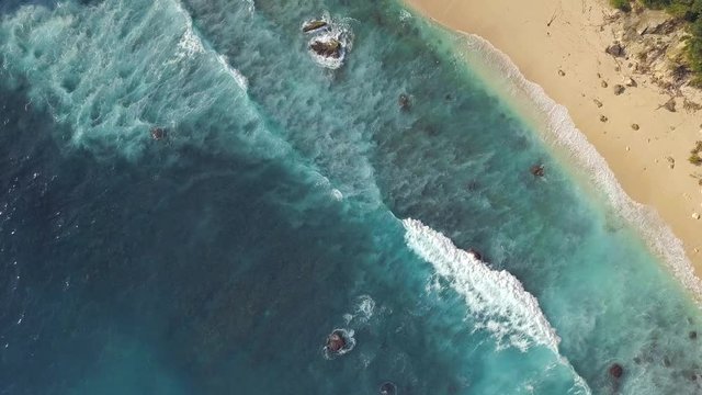 Beautiful Tropical Beach and Blue Ocean Waves. 4K Aerial Natural Travel Background Footage.