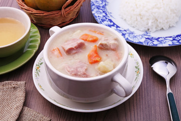 A bowl of creamy pork stew. 