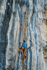 Fototapeta premium man climbs tufa rock, Chitdibi, Turkey