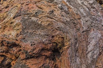 Frozen volcanic lava closeup thousands of years after the eruption. Volcanic background.