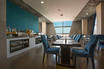 Hotel breakfast, buffet table, restaurant interior