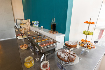 Hotel breakfast, buffet table, restaurant interior