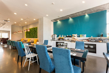 Hotel breakfast, buffet table, restaurant interior