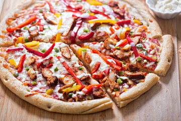 Chicken fajita pizza with peppers and garlic dip