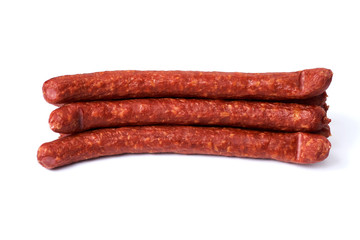 Thin smoked sausages isolated on a white background