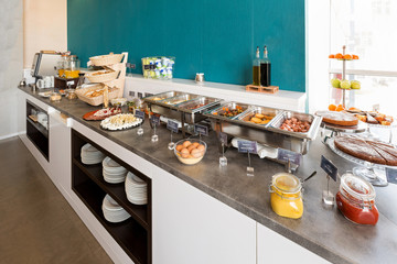 Hotel breakfast, buffet table, restaurant interior