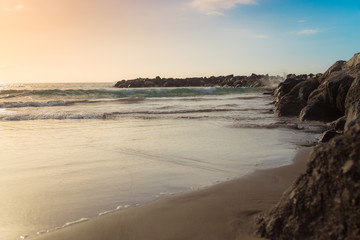Canary Islands. Beautiful beaches on a sunny day on the island of Tenerife. Shores of the atlantic ocean.
