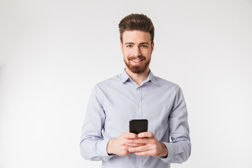 Portrait of a happy young man dressed in shirt