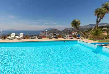 Swimming pool on the Amalfi Coast with views of the Gulf of Naples and Vesuvius. Sorrento. Italy