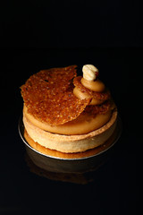 caramel tart on a dark background