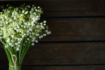 Forest flowers on wood background