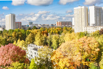 Obraz premium City landscape through a window glass. Autumn