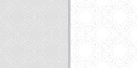 Light gray floral backgrounds. Set of seamless patterns
