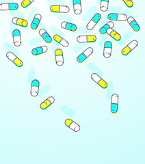 Colorful capsules falling background.