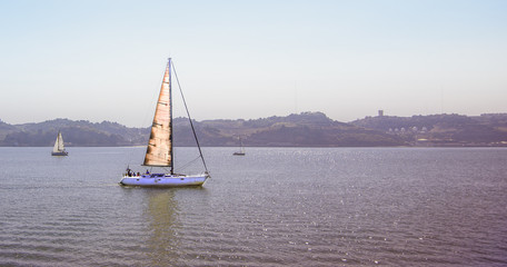 Obraz premium ship sailboat on the river there is a place for the inscription