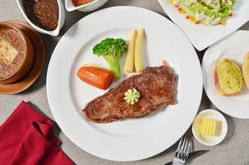 New York Steak served with salad and soup