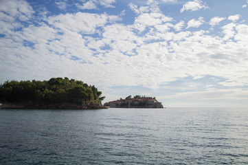 Fototapeta premium Panorama of Budva Riviera with Sveti Stefan Island, Montenegro