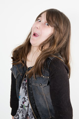 Portrait of beautiful brunette girl fooling in the studio on white background