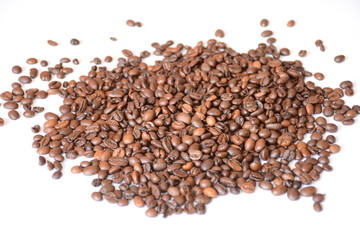 Black coffee scattered on a white background.