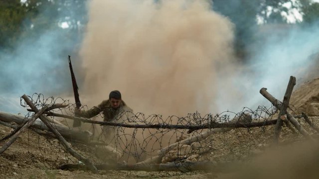 WW2 soldier on the battlefield, slow motion