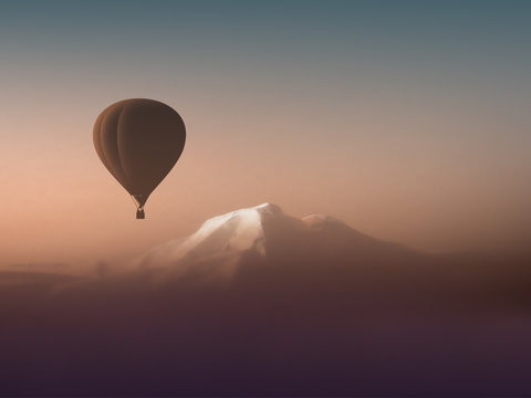 silhouette hot air balloon flying over the mountains. wonderful landscape mountain view copyspace. air sports travel aerostat