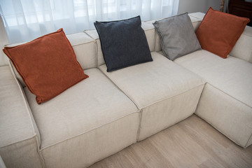 High angle view of couch with multicolor pillows