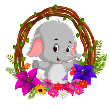 cute elephant in root of tree frame with flower