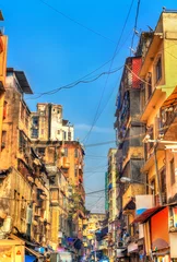 Zelfklevend Fotobehang Typical street in central Mumbai, India © Leonid Andronov