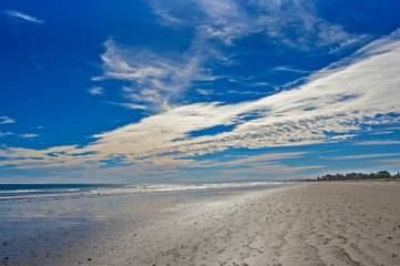 Fototapeta na wymiar Empty wide beach and blue sky
